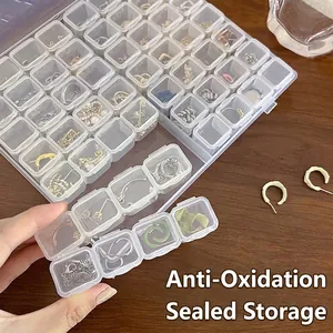 Minimalist clear jewelry organizer box with multi-grid compartments for earrings and rings