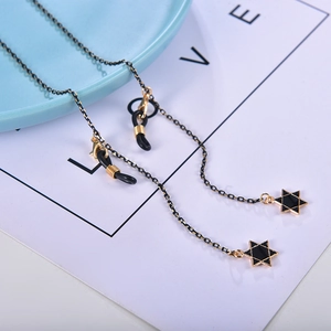 Fashionable gold and black chain mask strap with black star pendant and rubber connectors