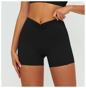 Detail of high waist V-cross waistband on black brushed compression yoga shorts