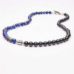 Detail view of 6mm lapis lazuli and obsidian beaded necklace with stainless steel OT clasp
