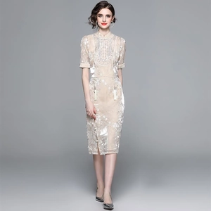 Elegant beige lace Qipao dress with tassels and sequin details in modern Chinese style