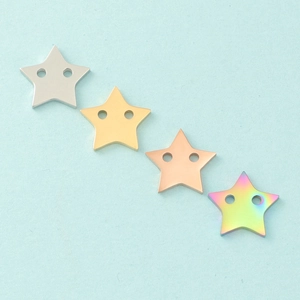 Detailed view of 12mm stainless steel star pendants in silver, gold, and rose gold finishes