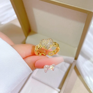 Adjustable gold plated heart ring with zircon stones in a premium jewelry gift box