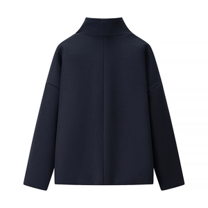 Detail view of navy blue jacket back featuring drop shoulder and vertical seam line