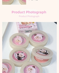 Close-up of pastel matte powder blush in round cases with cute animal illustrations
