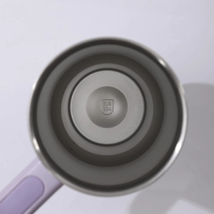 Interior view of insulated tumbler showing SUS 304 stainless steel bottom and purple handle