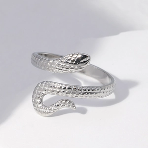 Silver snake-shaped adjustable stainless steel open ring with detailed scale texture