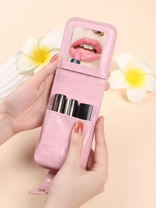 Pink faux leather crocodile pattern lipstick case with built-in mirror and gold buckle