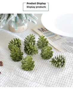 Detailed view of eight green plastic pine cones on a soft white textured cloth background