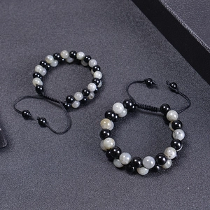 Double-layer handmade beaded bracelet featuring natural moonstone and black glossy beads