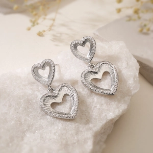 Silver double heart drop earrings with cubic zirconia on white crystal stone