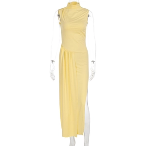 Detail of light yellow sleeveless high neck dress with asymmetric ruching and side slit