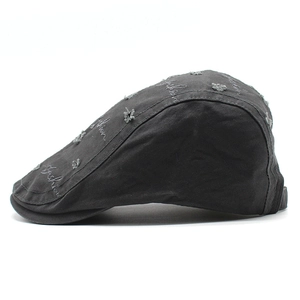 Distressed black cotton beret cap with Fashion embroidery and vintage ripped detail