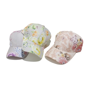 Women's floral cotton linen baseball caps with assorted summer flower patterns for sun protection