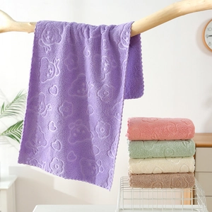 Soft coral fleece towel with embossed bear pattern in five pastel colors for bathroom