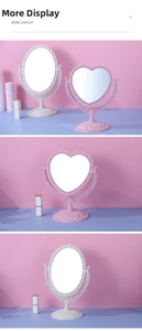 Close-up of heart and oval vintage desk mirrors with ornate relief carving and rotating base