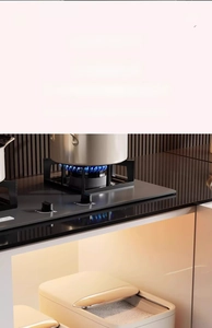Close-up of airtight rice storage container with metal handle in kitchen cabinet
