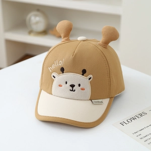 Close-up of baby baseball cap featuring 3D ears and cute bear embroidery detail