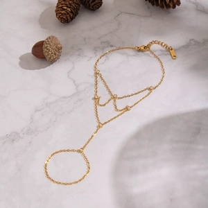 Elegant 18K gold plated stainless steel finger chain bracelet with zircon stones
