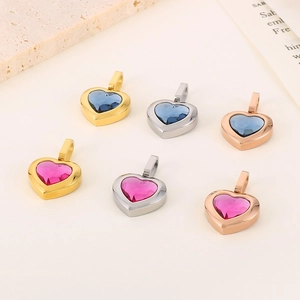 Luxurious heart-shaped gemstone pendants in diverse metallic finishes and colors