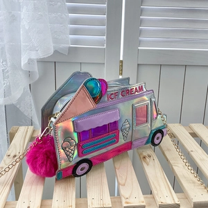 Close-up of ice cream truck bag featuring holographic finish and pink pom-pom detail