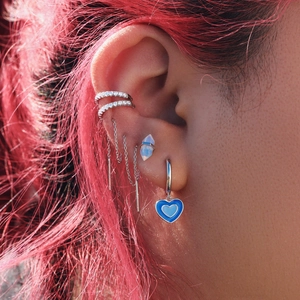 Detailed close-up of S925 silver fringe earrings with blue enamel heart and zircon studs
