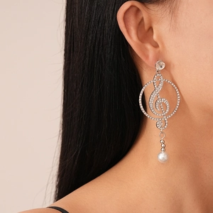 Elegant silver treble clef music earrings with sparkling rhinestones and white pearls