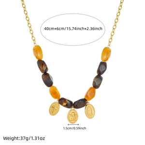 Retro multi-element gold necklace with resin beads and oval religious pendants