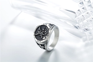 Macro detail of Archangel St. Michael wings cross ring with St. Michael Protect Us engraving
