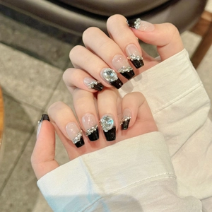 French black press-on nails with luxury rhinestones and polished square-oval shape