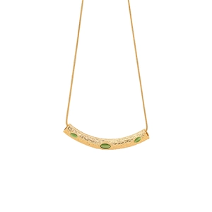 Irregular textured gold necklace with three green gemstones on a white background