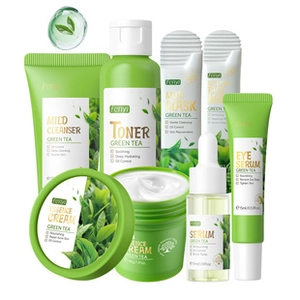 Macro view of 6-piece green tea skincare set including mud mask, toner, and face cream