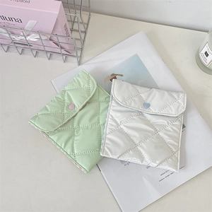Quilted sanitary pouch set in mint and white with heart buckle and soft fabric detail