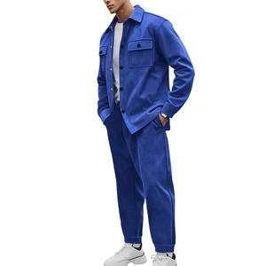 Side view of men's royal blue faux suede jacket and trousers set on a male model
