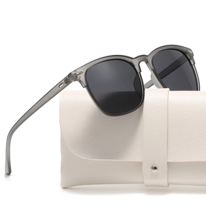 Polarized sunglasses with matte grey frames and a cream faux-leather protective case