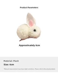 Detail view of 6cm white plush bunny hair clip with pink metal alligator base