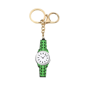 Detail of green acrylic watch keychain with gold metal clasp and lobster hook