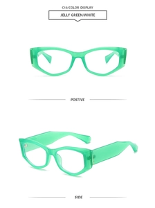 Detail view of jelly green and white cat-eye sunglasses with translucent frames