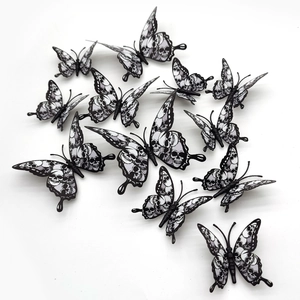 Détail de 12 stickers muraux papillon 3D noirs et blancs avec motifs de crânes