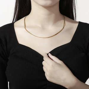 Minimalist gold-plated flat snake chain necklace worn on neck for women jewelry styling
