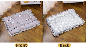 Dual-sided plush pet mat showing colorful cow pattern front and grey star pattern back