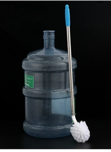 Detail of long stainless steel handle water barrel brush with dense round white bristles