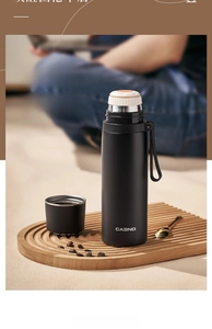 Detailed view of the CASNO 316 stainless steel vacuum flask with a dual-use lid and carry rope