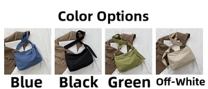 Detail view of stylish knot shoulder bags in blue, black, green and beige colors