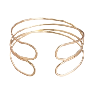 Minimalist layered gold cuff bracelet with wavy geometric lines and open design