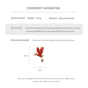 Detailed size specifications for red enamel fairy brooch featuring gold alloy and diamonds