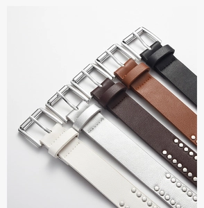 Detail view of five punk-style PU leather belts with silver rivets and square metal buckles