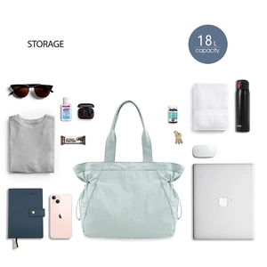 Mint green 18L waterproof tote bag for yoga and travel shown with its large storage capacity