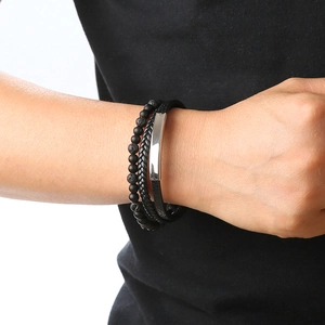 Detail of multi-layer leather bracelet with magnetic clasp and black obsidian beads