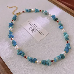 Bohemian aquamarine gemstone and pearl beaded necklace with adjustable gold-tone chain